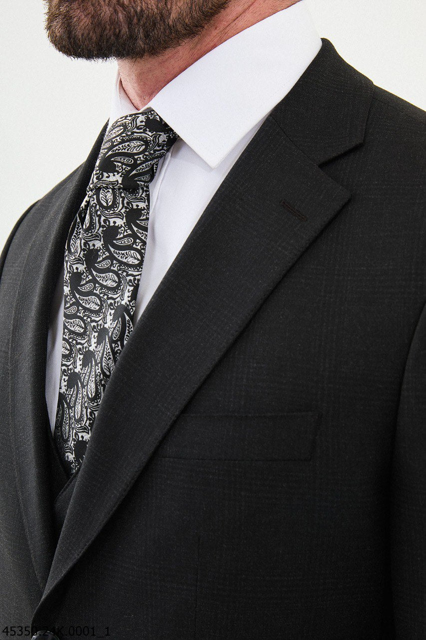 Black Three-Piece Suit with Paisley Accent Tie